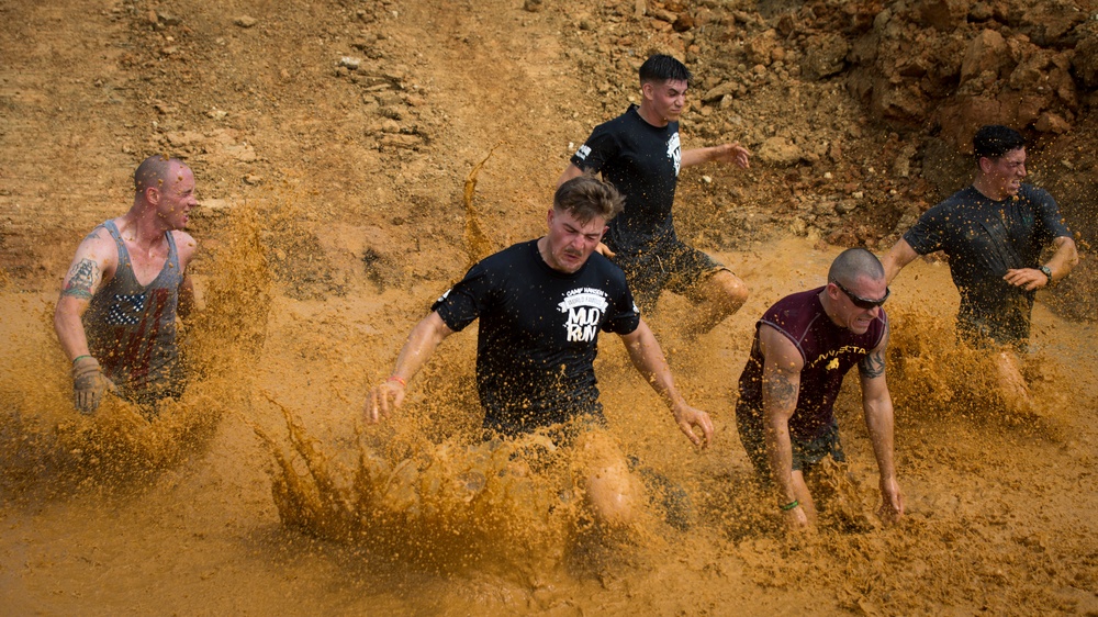 Down and Dirty | Service members and Okinawans gather for Camp Hansen’s annual mud run