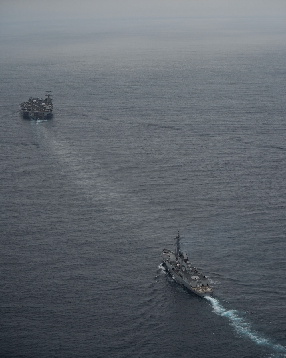 Nimitz Carrier Strike Group participate in a show of force strait transit exercise