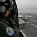 Helo Prepares to Land on Nimitz Flightdeck