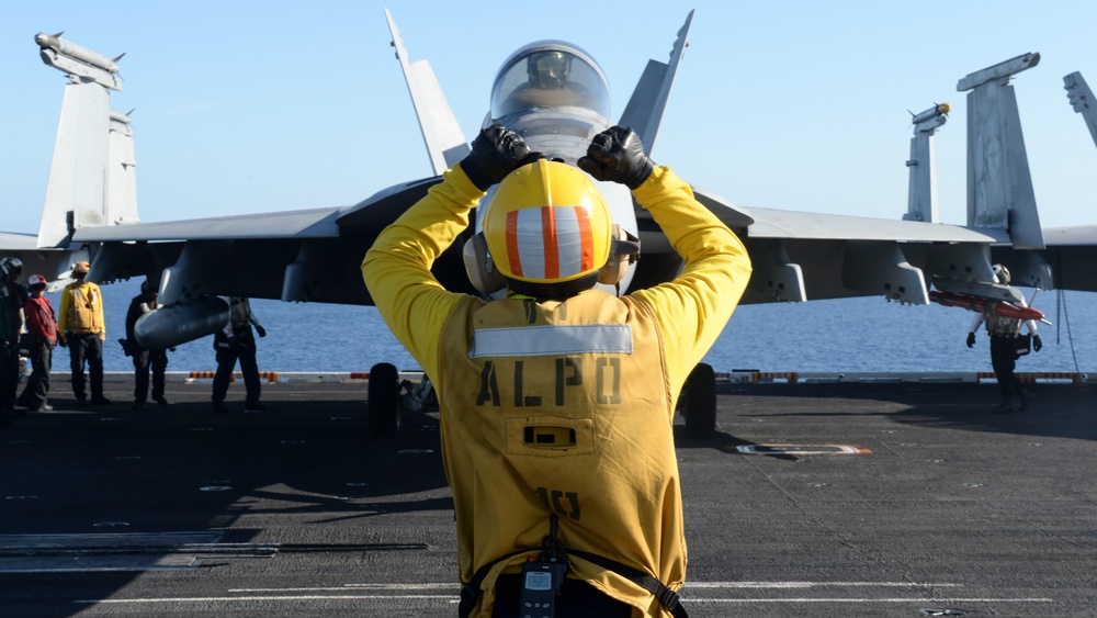 Sailor directs aircraft