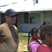 ESL Sailor coaches a game of tag at local Guam school