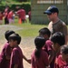 ESL Sailor participates in local Guam school to promote health and well being.