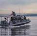 Sailors from Coastal Riverine Squadron 11 (CRS-11) conduct a security patrol