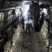 34th WS load HH-60s into C-17