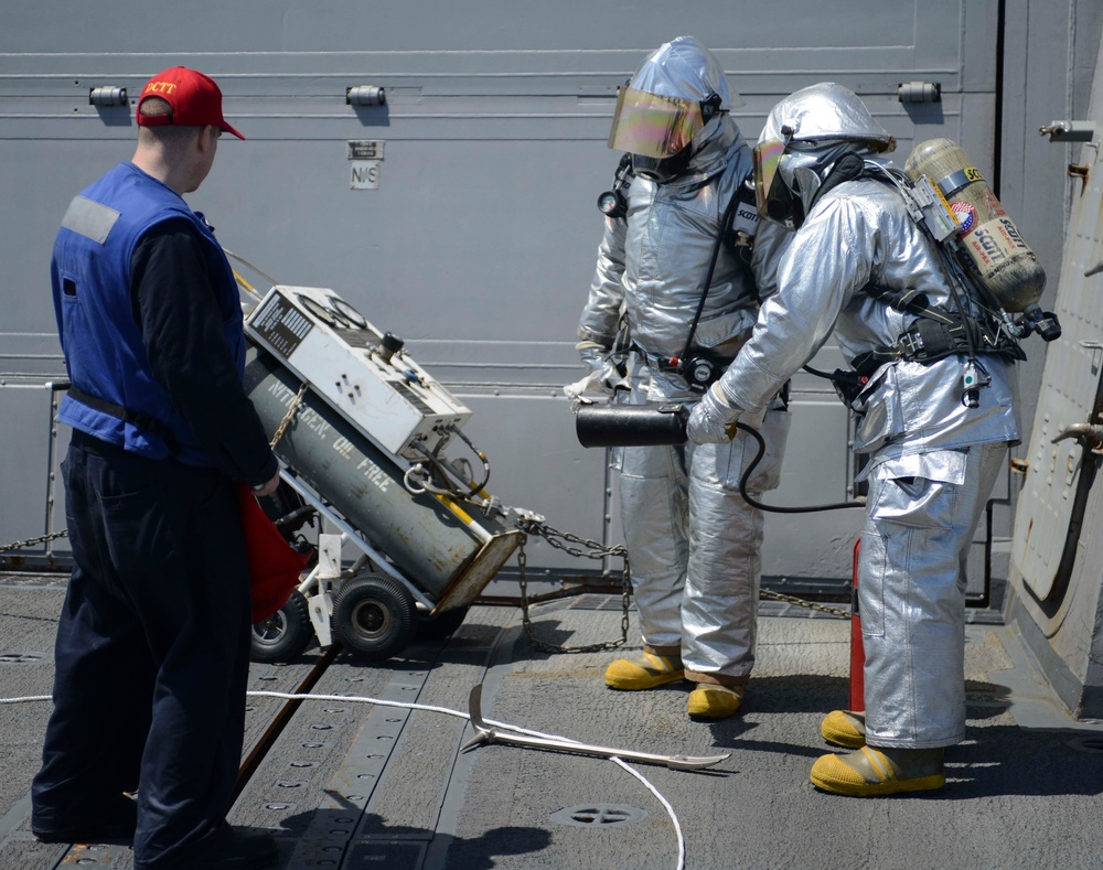 USS Kidd (DDG 100) Conducts Crash and Salvage Drill