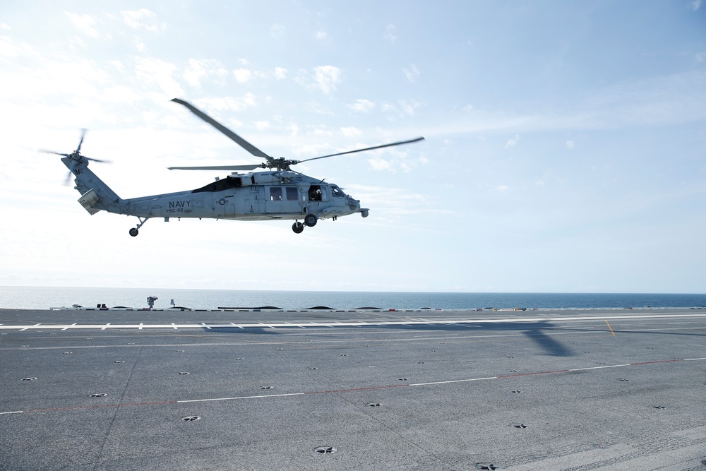 helo landing on flight deck