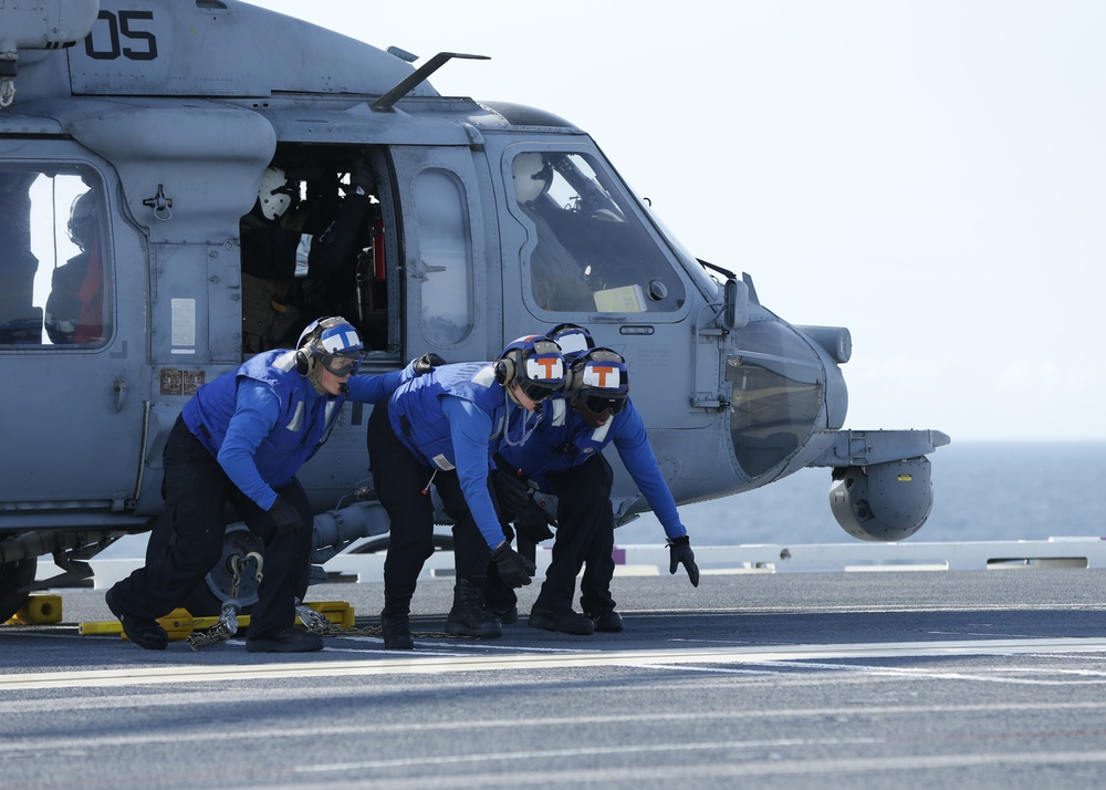 helo landing on flight deck