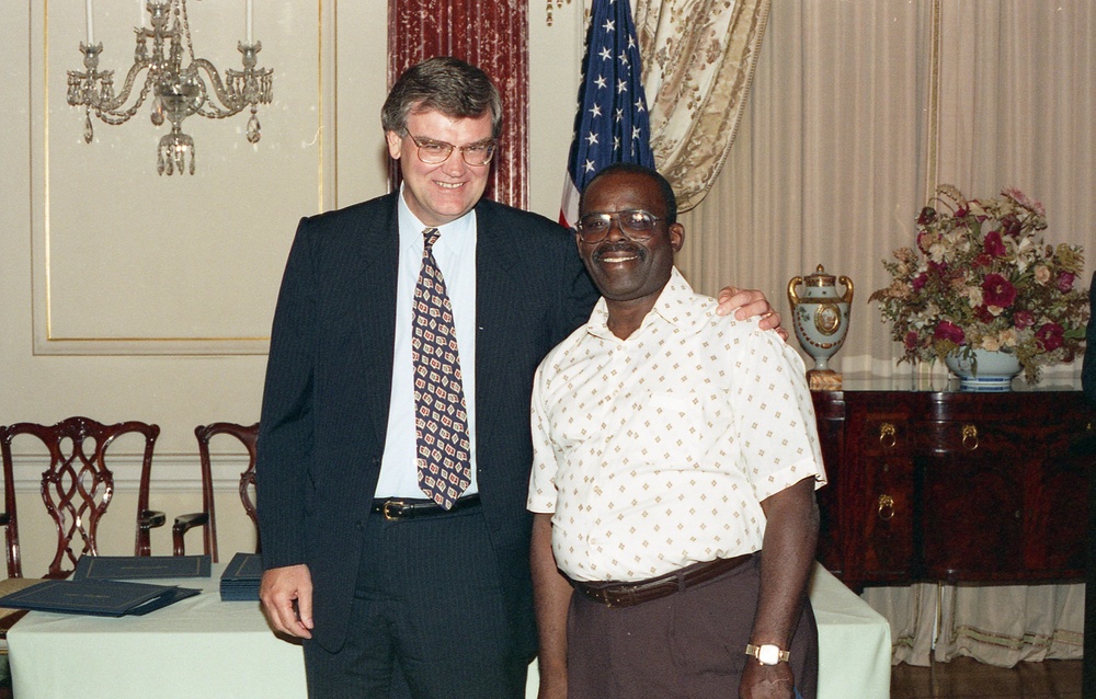 Admin. Atwood presenting Retirement Awards 1994