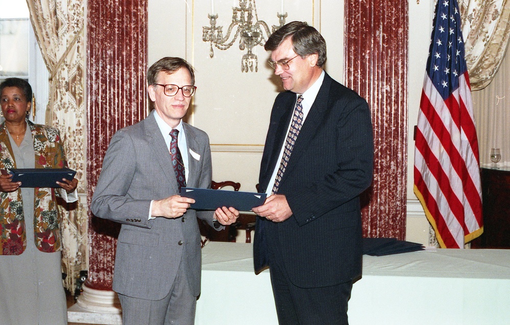 Admin. Atwood presenting Retirement Awards 1994