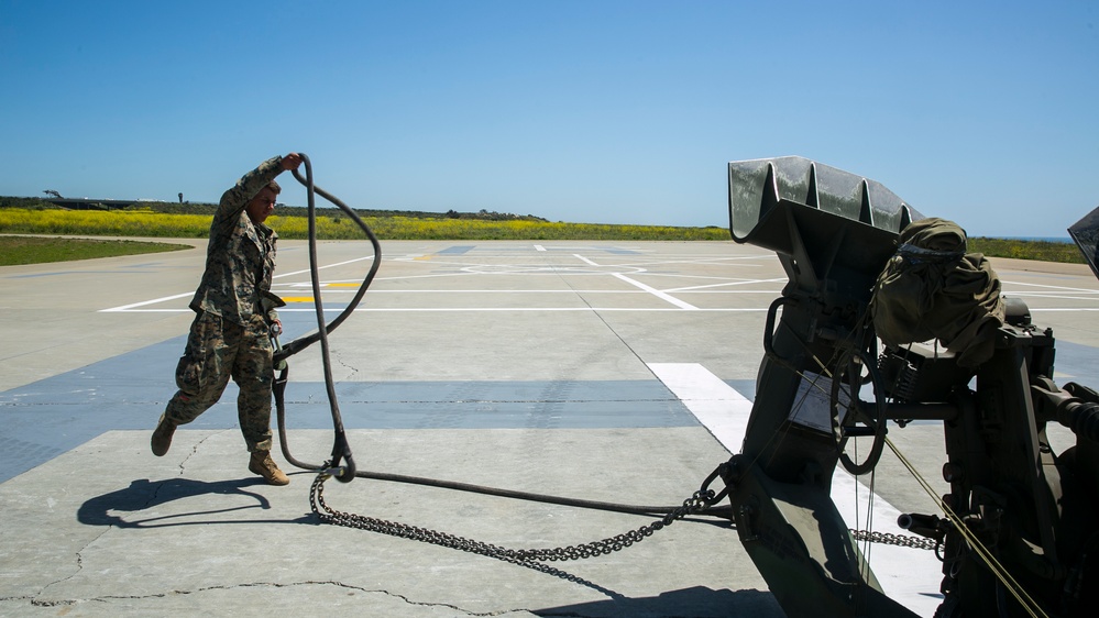 Delivering Artillery: CH-53E rapidly deploys the M777 Howitzer