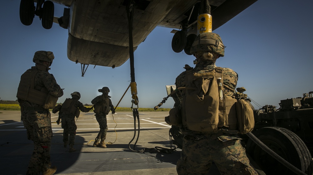 Delivering Artillery: CH-53E rapidly deploy the M777 Howitzer