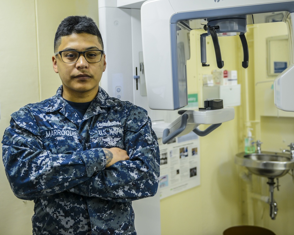 Hospital Corpsman Christopher Marroquin Poses for a Photo in the Dental Department