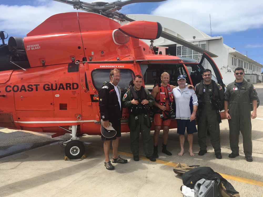 Coast Guard helicopter crew rescues 2 boaters from life raft in the Silver Banks