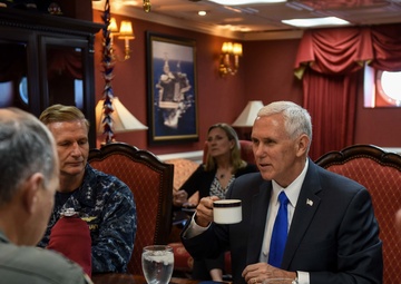 Vice President Michael R. Pence meets with senior officials in the commanding officer's inport cabin aboard Navy’s forward-deployed aircraft carrier, USS Ronald Reagan
