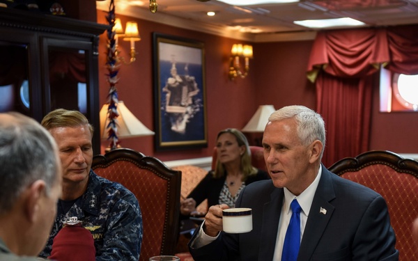 Vice President Michael R. Pence meets with senior officials in the commanding officer's inport cabin aboard Navy’s forward-deployed aircraft carrier, USS Ronald Reagan