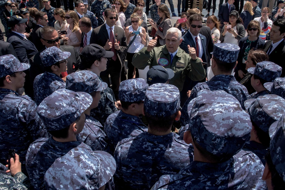 Vice President Michael R. Pence Meets Japanese Service Members on the Flight Deck of USS Ronald Reagan (CVN 76)