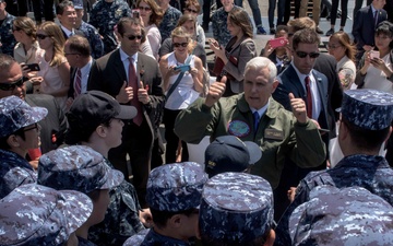 Vice President Michael R. Pence Meets Japanese Service Members on the Flight Deck of USS Ronald Reagan (CVN 76)