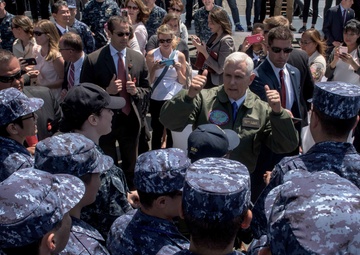 Vice President Michael R. Pence Meets Japanese Service Members on the Flight Deck of USS Ronald Reagan (CVN 76)