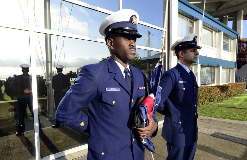 Coast Guard members wear Service Dress Blues in observation of Child Abuse Prevention and Sexual Assault Awareness Month