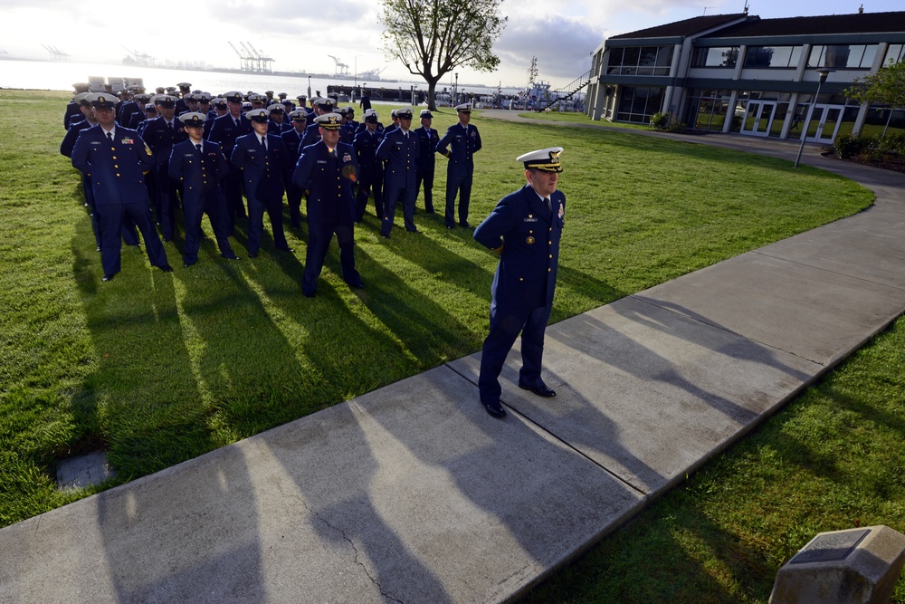 Sector San Francisco Coast Guard members stand in preparation of morning colors