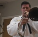 Navy Band Southeast’s Reception Combo performs at Headquarters branch of the Clay County Library for a local audience