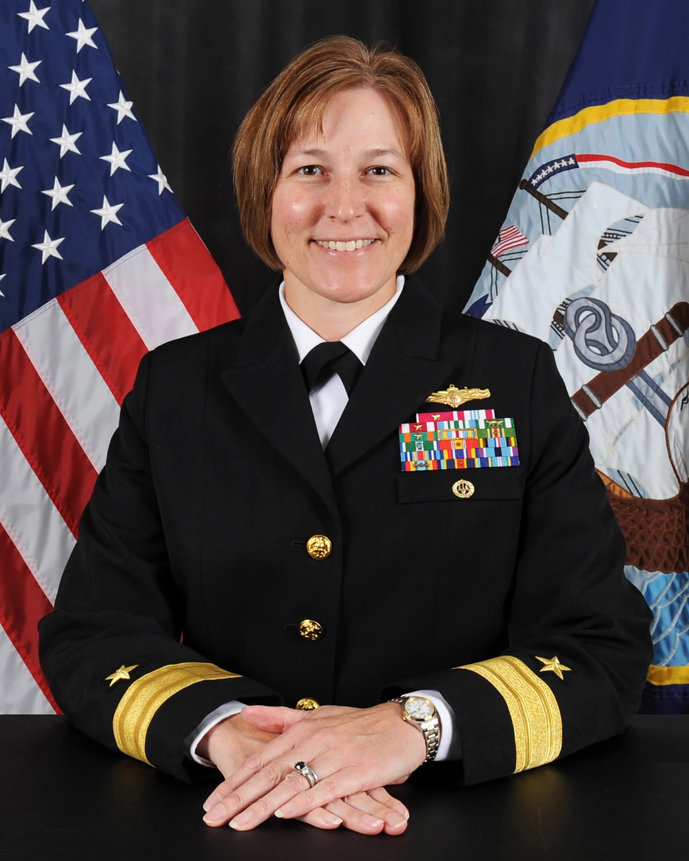 Offical portrait for RDML Kelly Aeschbach.