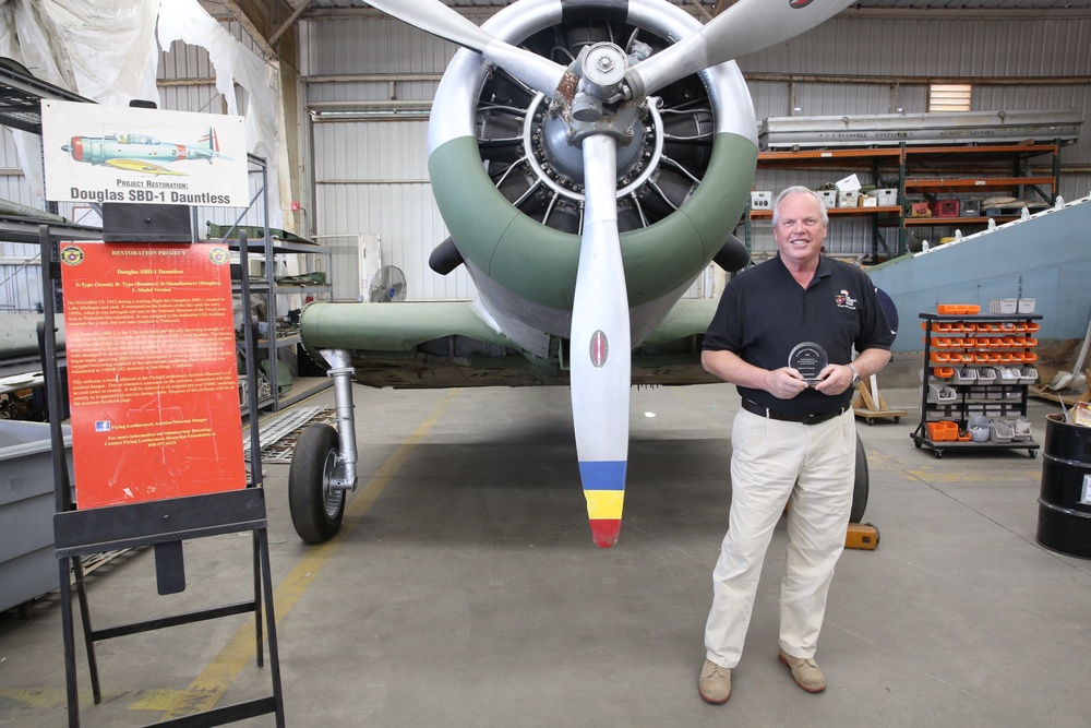Dauntless determination: volunteer restores WWII plane