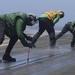 Sailors Prep Catapult