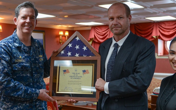 Mr. Cord Sterling, Ms. Thuc Minh Nguyen, and Capt. Buzz Donnelly Pose for a Photo in the CO’s Inport Cabin