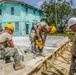 Soldiers assigned to the 672nd Engineer Company drill holes into a concrete slab