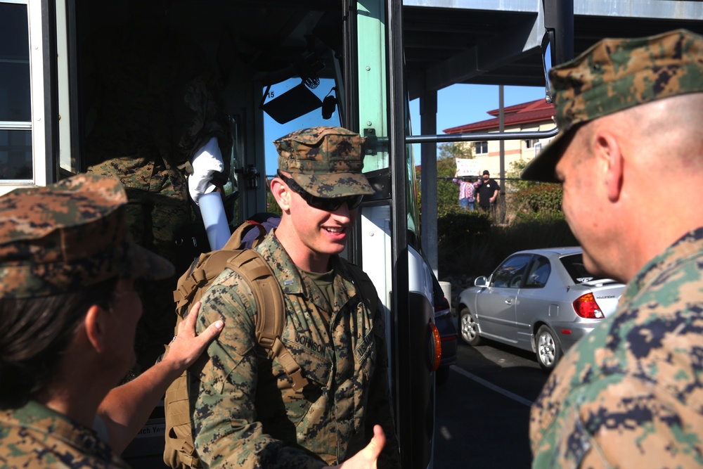Marines and Sailors with the Georgina Liason Team return home