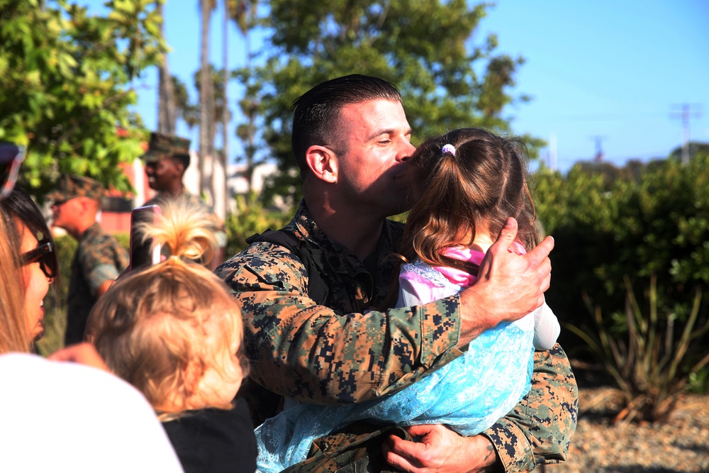 Marines and Sailors with the Georgian Liaison team return home