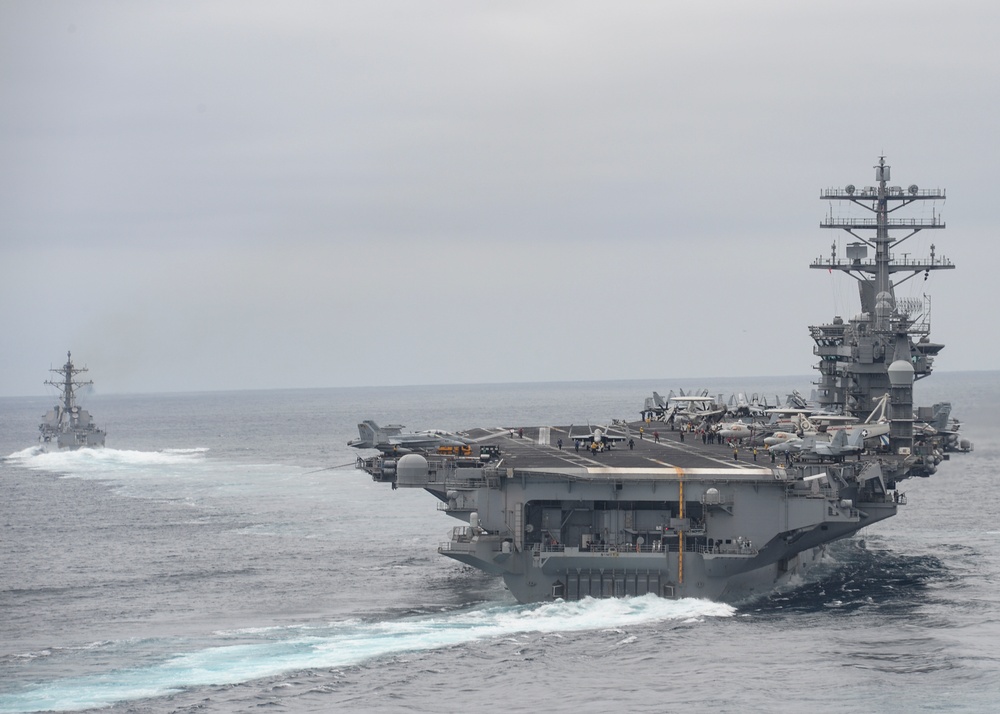 Nimitz Carrier Strike Group participate in a show of force strait transit exercise
