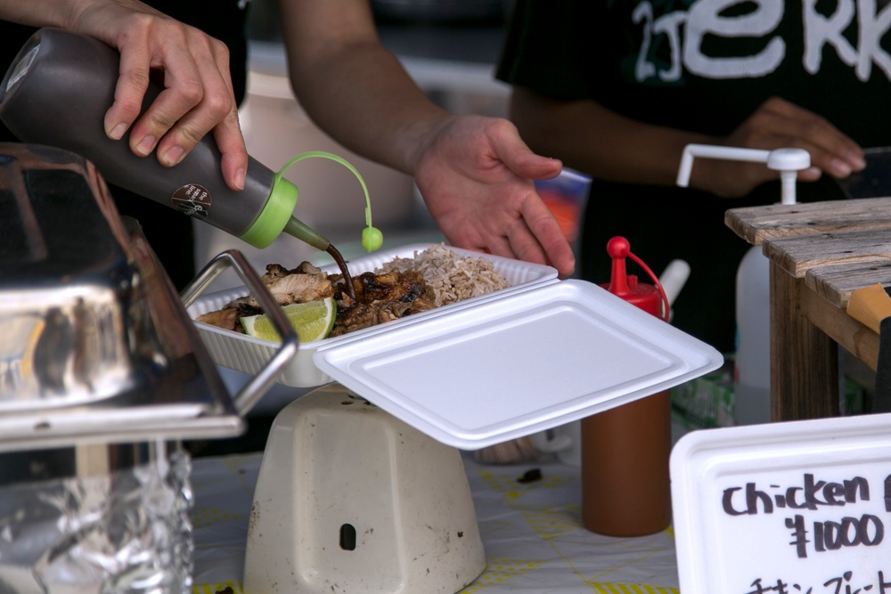 Marine Veteran, Entrepreneur serves his Jamaican Style Food at the Camp Foster Festival