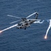 An MH-60R Sea Hawk from the Helicopter Maritime Strike Squadron (HSM) 78 “Blue Hawks” fires chaff flares during a training exercise near the aircraft carrier USS Carl Vinson (CVN 70)