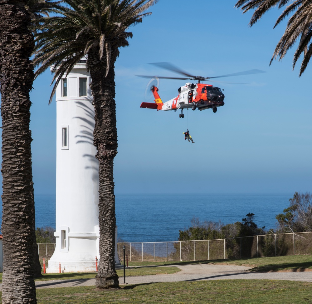 U.S. Coast Guard aircrews participate in cliff side rescue training