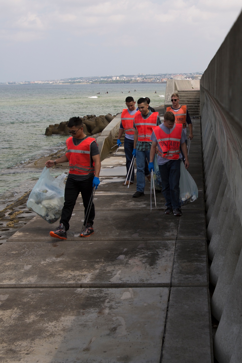 Service members clean Okinawa seawall, sea floor