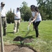 Arlington National Cemetery horticulture department conducts a tree planting ceremony in Section 34