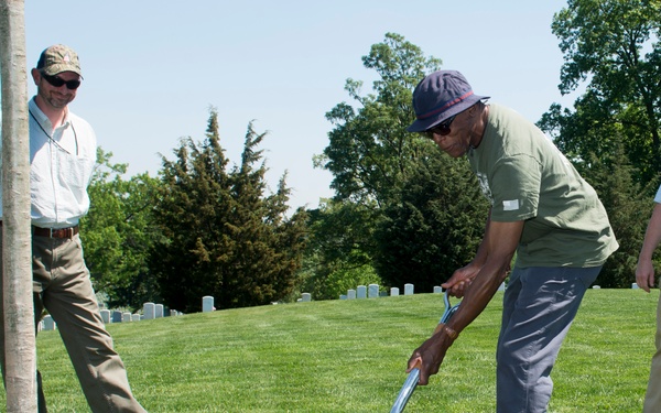 Arlington National Cemetery horticulture department conducts a tree planting ceremony in Section 34