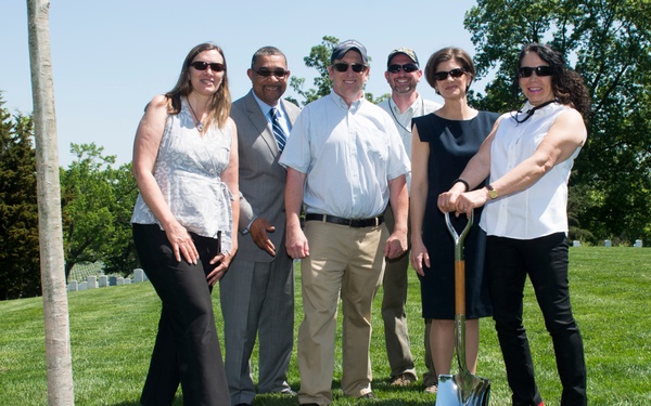 Arlington National Cemetery horticulture department conducts a tree planting ceremony in Section 34