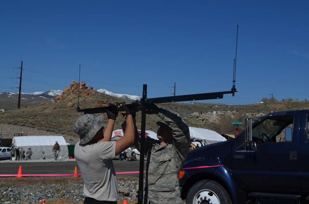 JISCC members assembling antenna mast