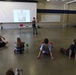 Army Reserve Soldiers recieve lecture from Yoga expert