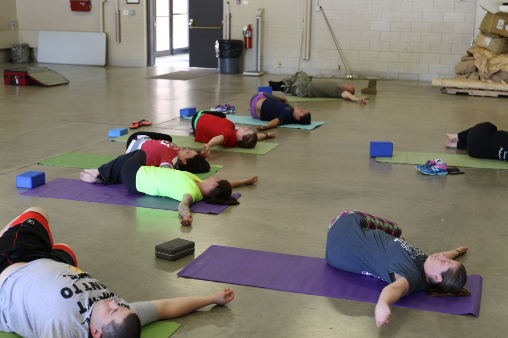 Army Reserve members perform Yoga exercise
