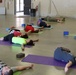 Army Reserve members perform Yoga exercise