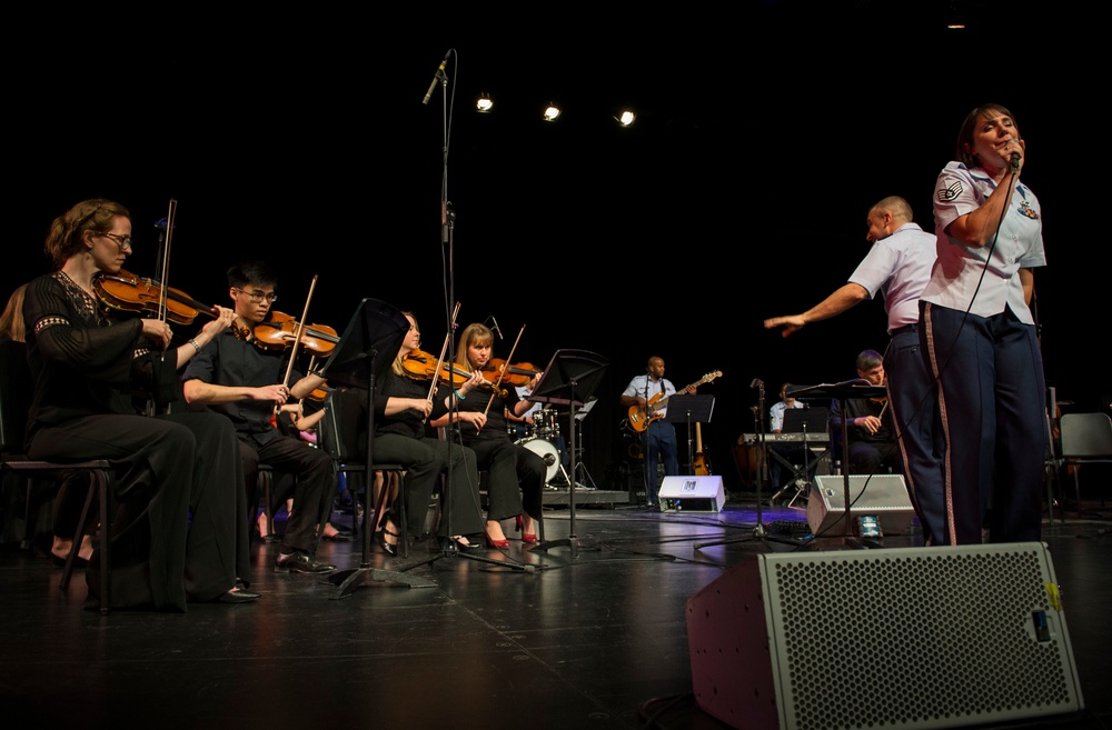 AFCENT band rocks out with community partners in Doha