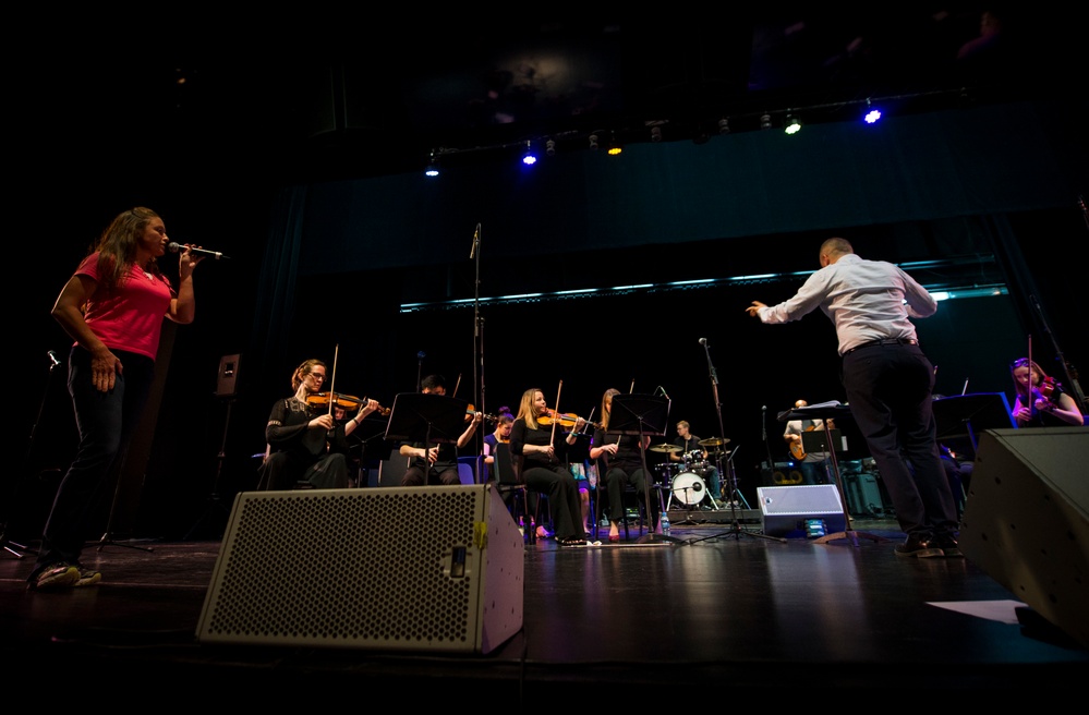 AFCENT band rocks out with community partners in Doha