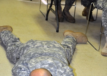 Demonstrating a prone firing position