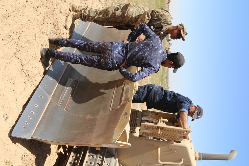 Paratroopers train Iraqi federal police on bulldozers