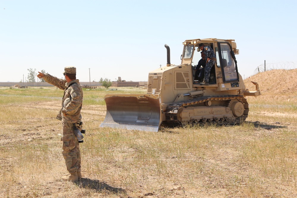 Paratroopers train Iraqi federal police on bulldozers