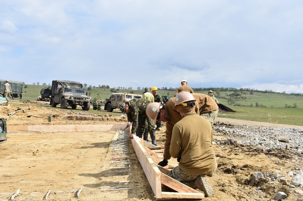 Navy Seabees Lay Foundation for Operations and Storage Building